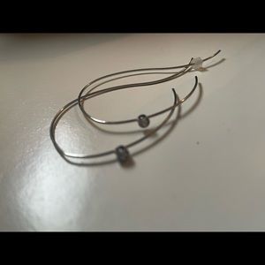 Pre-owned silver thread through earring so what small diamond detail.